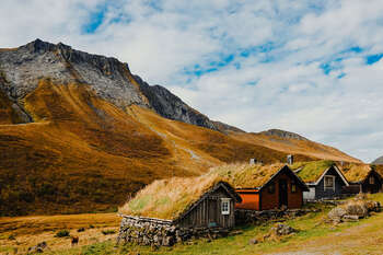 Mountainous landforms ,Grass ,Mountain ,Hill ,Natural landscape.