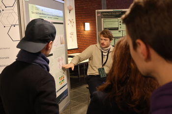 Outerwear ,Jacket ,Job ,Conversation ,Poster session.